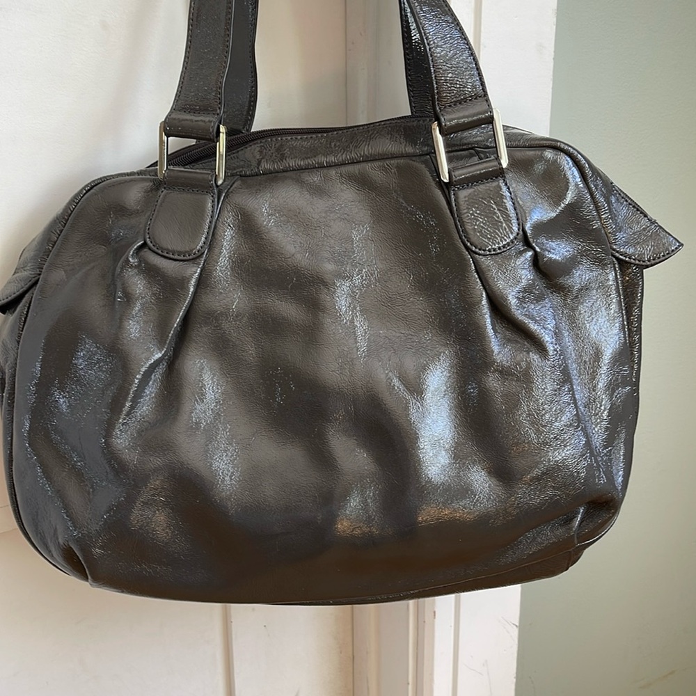 Hobo Intrrnational patent leather gray handbag.